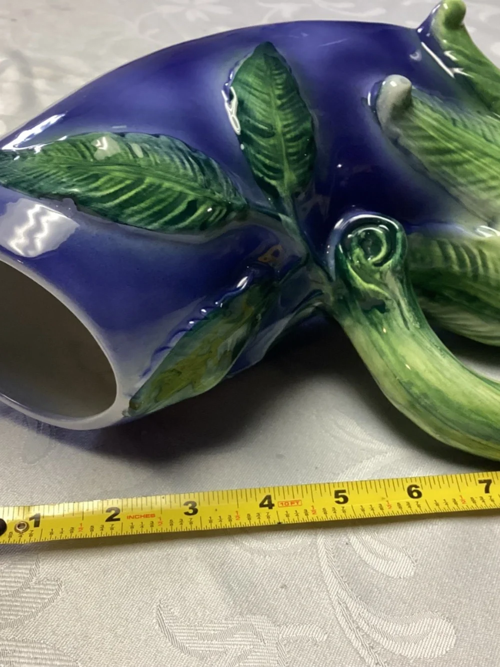 Eggplant pitcher majolica style. Fabulous item